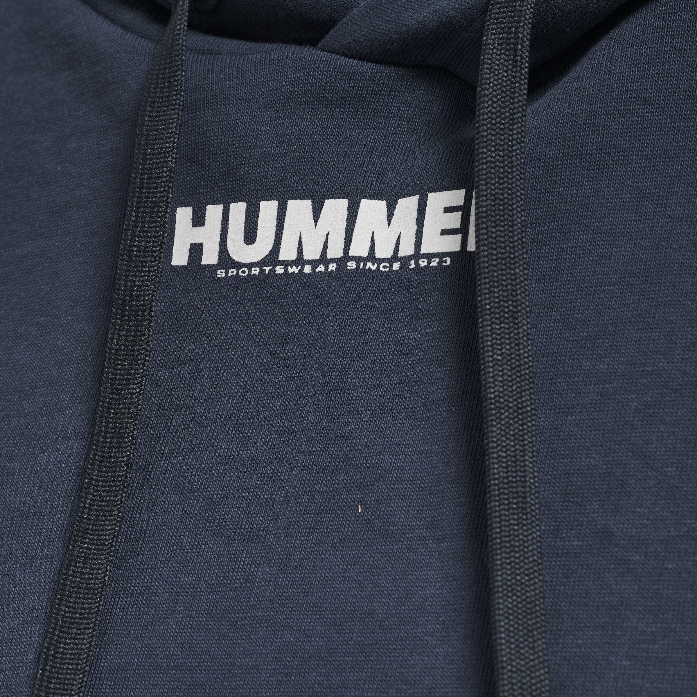 GUILD PRIME × hummel 総柄プリントフーデットジャケット