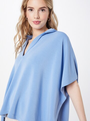 Brig Født komplet COMMA Poncho in Himmelblau | ABOUT YOU