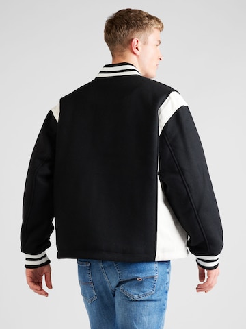 Tommy JeansPrijelazna jakna - crna boja