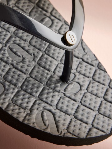 Séparateur d'orteils B by Ted Baker en noir