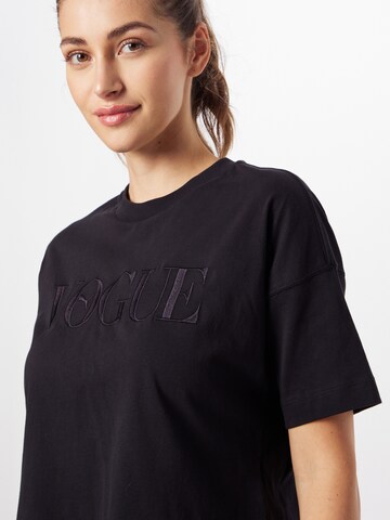 PUMA Koszulka funkcyjna 'PUMA x Vogue Collection' w kolorze czarny