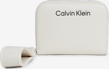 Porte-monnaies Calvin Klein en beige : devant