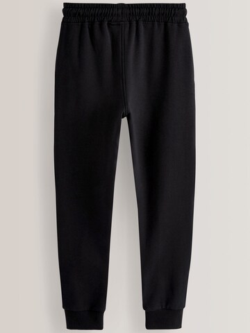 Skinny Pantaloni di Next in nero