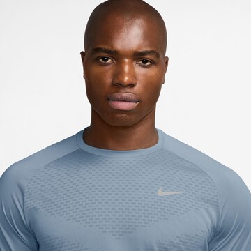 NIKE Performance Shirt 'DFADV STRIDE' in Blue