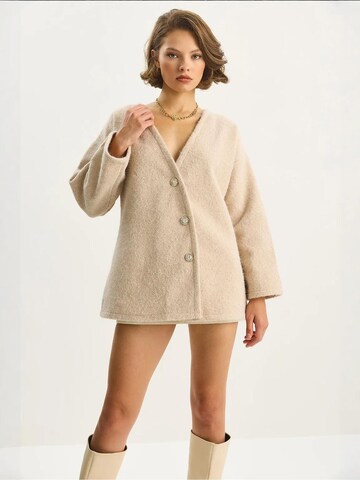 Cardigan Bianco Lucci en beige