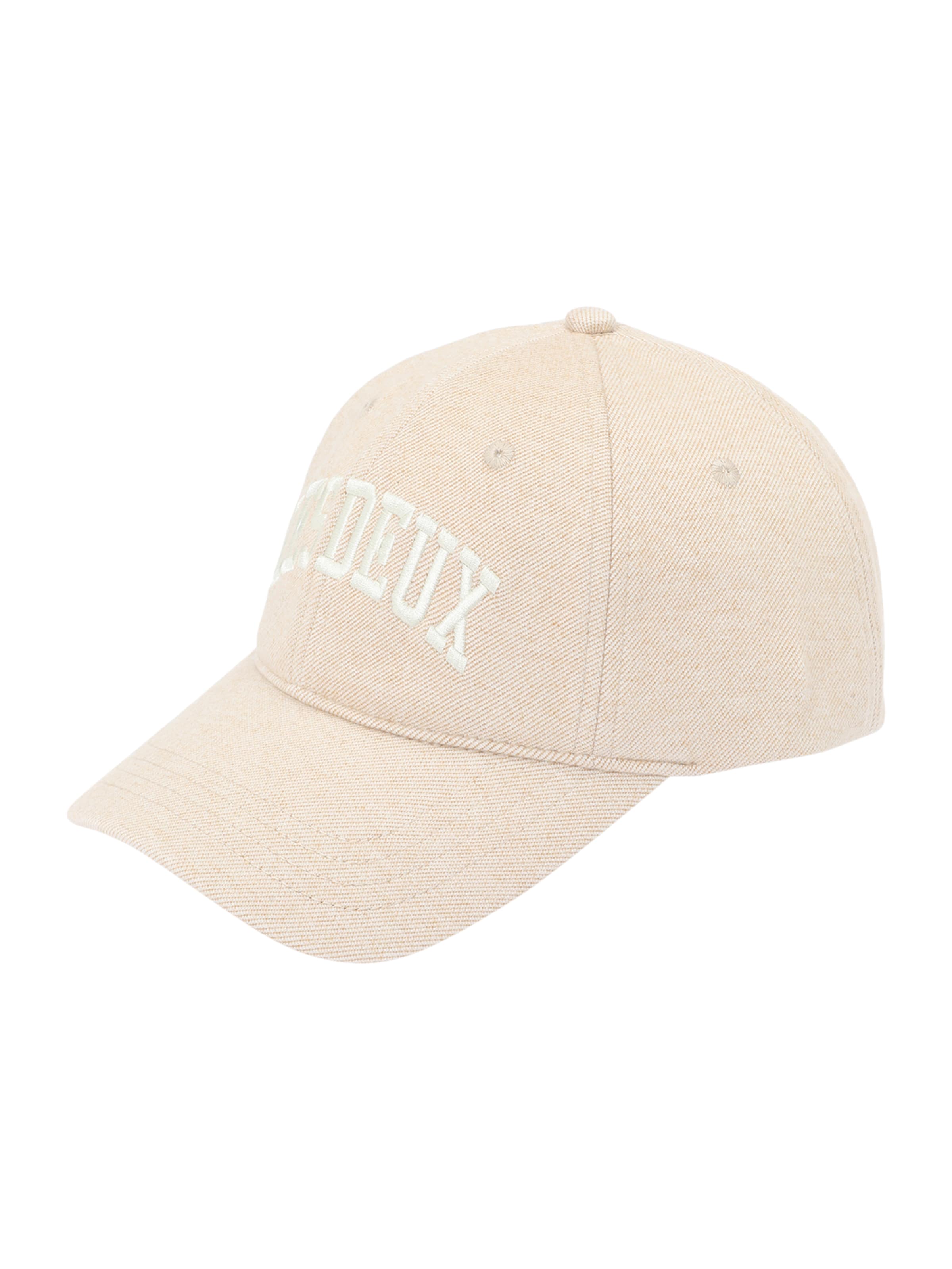 Les Deux Nokamüts, värv beež: eest vaates