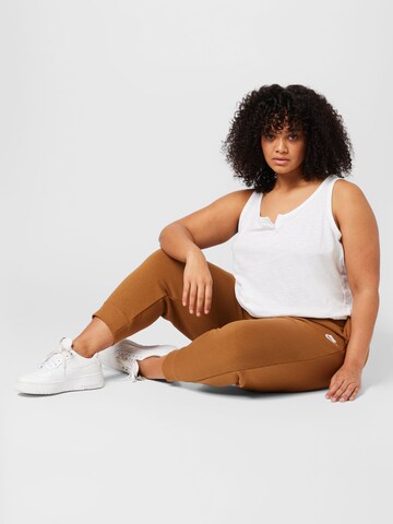 Nike Sportswear Tapered Sportbroek in Bruin