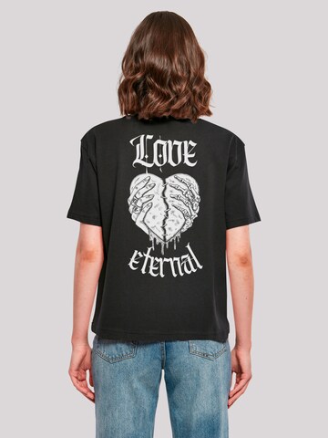 T-shirt 'Love Eternal Streetwear Valentinstag Herz In Händen' F4NT4STIC en noir : devant