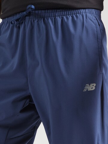 new balance Конический (Tapered) Спортивные штаны 'Essentials Active' в Синий