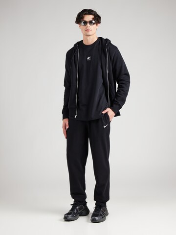 Nike Sportswear Tapered Hose in Schwarz