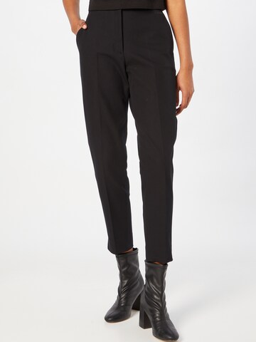 Pantalon à plis Calvin Klein en noir : devant