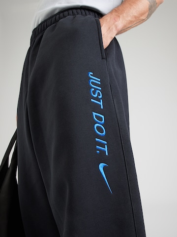 Nike Sportswear - Tapered Pantalón 'CLUB' en negro