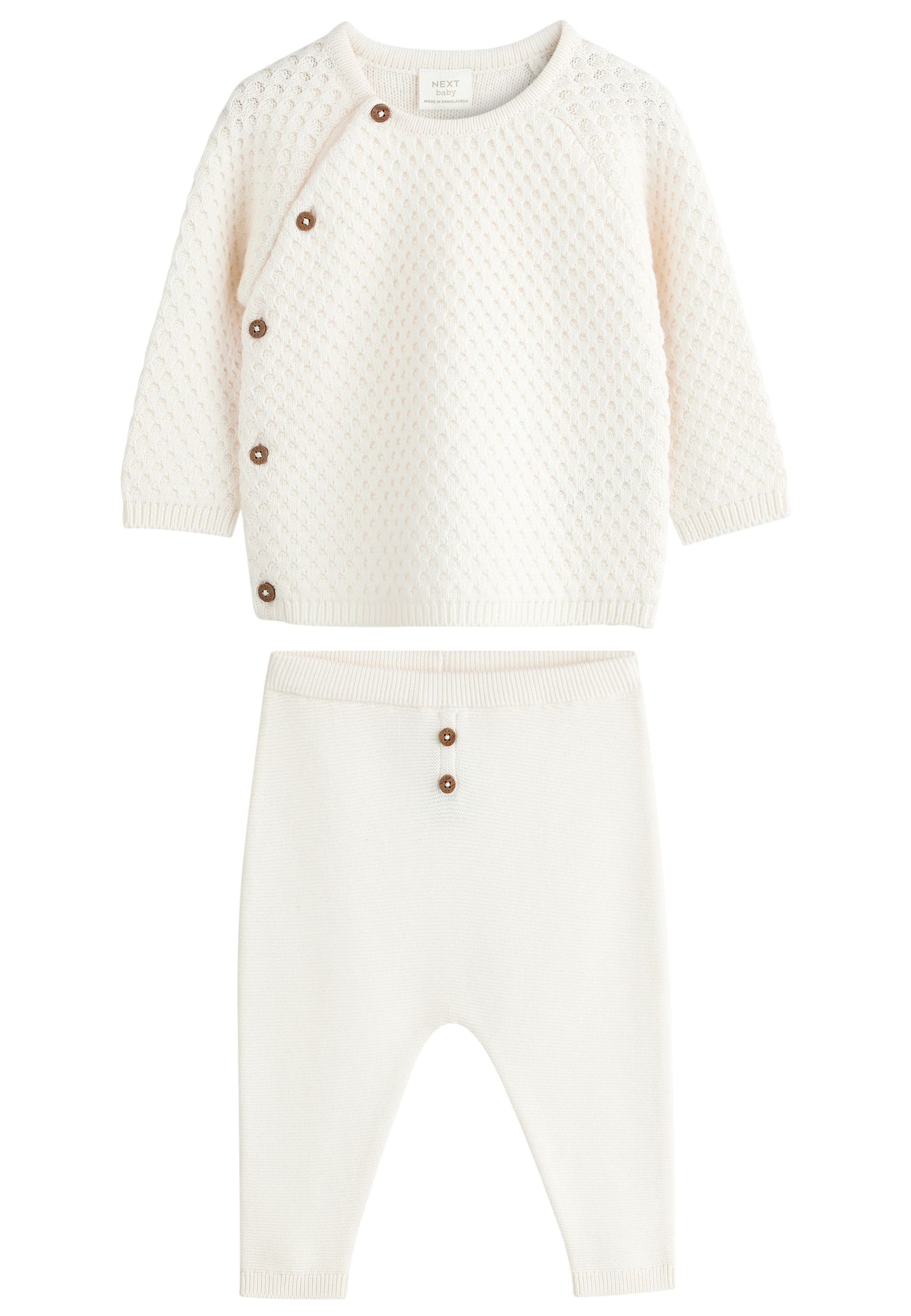 Next Set i vit: framsida