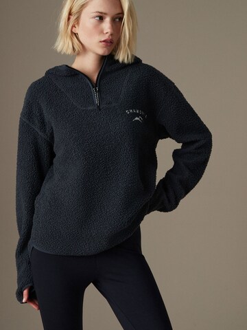 Next Pullover in Grau