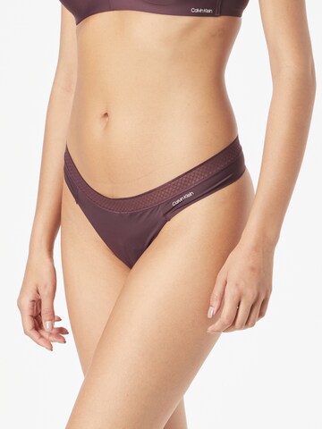 Calvin Klein Underwear Thong in Purple: front