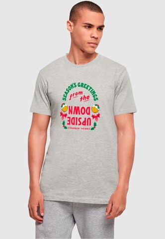 ABSOLUTE CULT T-Shirt 'Stranger Things - Upside Down Seasons Greetings' in Grau: Vorderseite