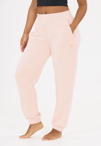 Athlecia Tapered Sportbroek 'Jillnana V2' in Rood: voorkant