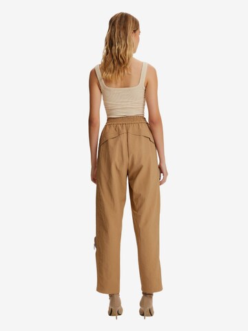 Tapered Pantaloni cargo di NOCTURNE in beige