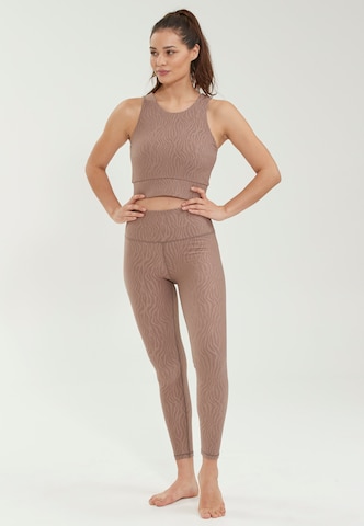 Athlecia Slimfit Sportbroek 'Alma' in Bruin