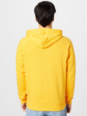 UNDER ARMOURRegular Fit Sportska sweater majica 'Rival' - narančasta boja