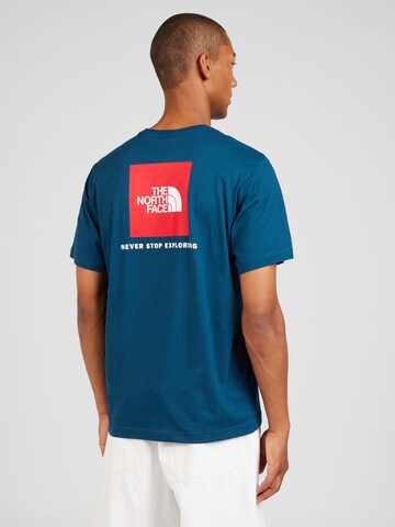 THE NORTH FACE T-shirt 'REDBOX' i grön: framsida