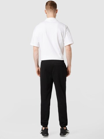 PUMA Tapered Broek in Zwart