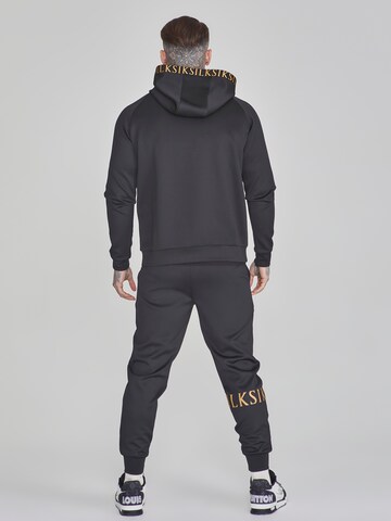 Tapered Pantaloni sportivi di SikSilk in nero