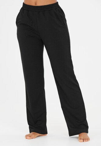 Athlecia Regular Workout Pants in Black: front