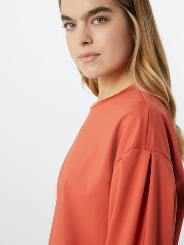 NU-IN Sweatshirt i orange