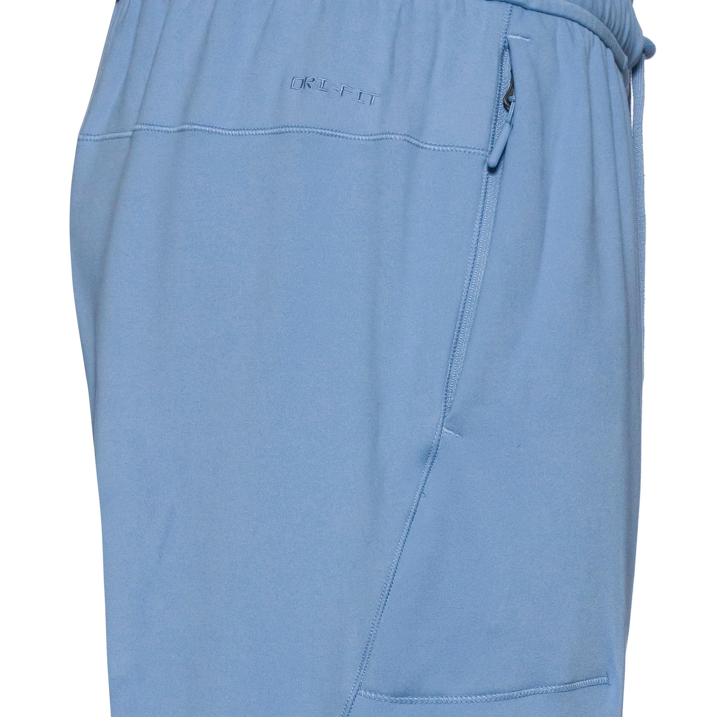 NIKE Tapered Workout Pants in Blue