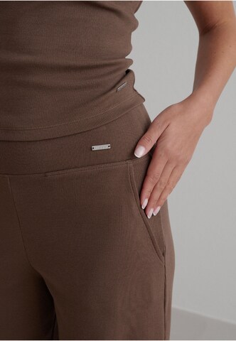 Loosefit Pantaloni sportivi 'Ease' di Aim'n in marrone
