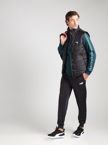 PUMA Спортивная жилетка 'ESS' в Черный