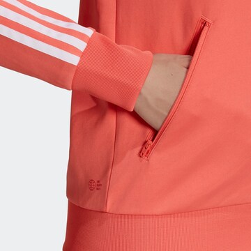 ADIDAS ORIGINALS - Sudadera con cremallera en rojo