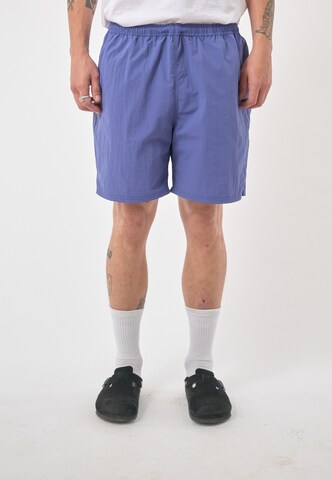 Cleptomanicx Regular Pants in Blue: front
