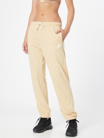 Nike Sportswear Tapered Pants in Beige: front