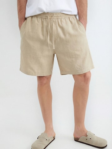 BALMOHK Loosefit Housut värissä beige: etupuoli