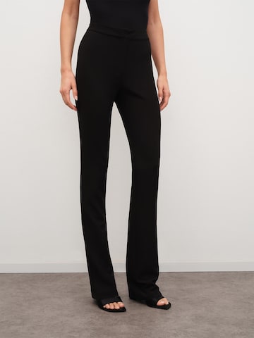 RÆRE by Lorena Rae Flared Pants 'Tall' in Black: front