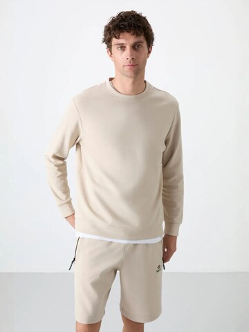 Sweat-shirt Tommy Life en beige