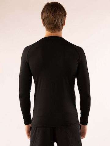 T-Shirt fonctionnel 'Honu' Divina en noir