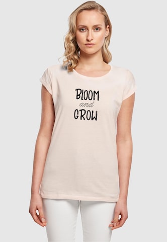 Merchcode T-Shirt 'Spring - Bloom And Grow' in Pink: predná strana