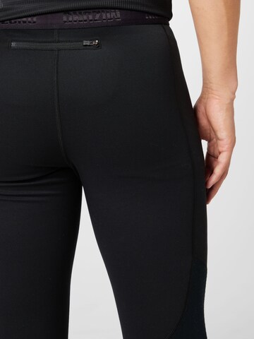 MIZUNO Skinny Sports trousers in Black