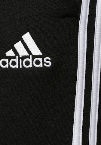 ADIDAS SPORTSWEAR Tapered Urheiluhousut värissä musta