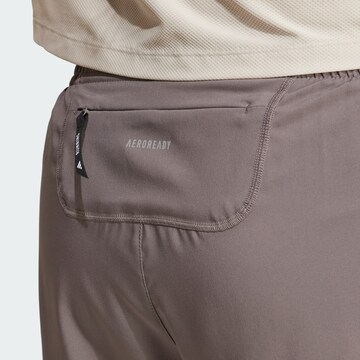 ADIDAS PERFORMANCE Regular Sporthose 'Own The Run' in Braun