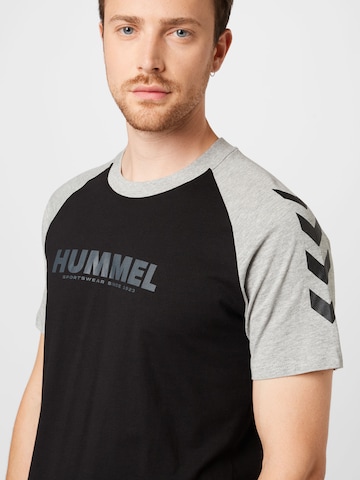 Tricou funcțional 'Legacy' de la Hummel pe negru