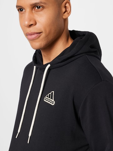 ADIDAS SPORTSWEAR Urheilullinen collegepaita värissä musta