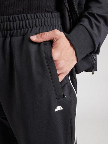 ELLESSE - Tapered Calças em preto