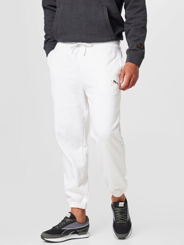 PUMA Tapered Workout Pants in White: front