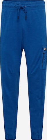 Nike Sportswear Tapered Trousers in Blue: front