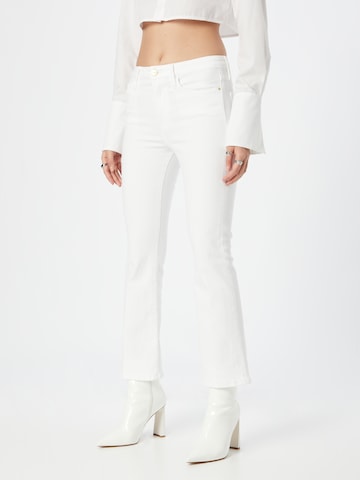 FRAME Flared Jeans in White: front