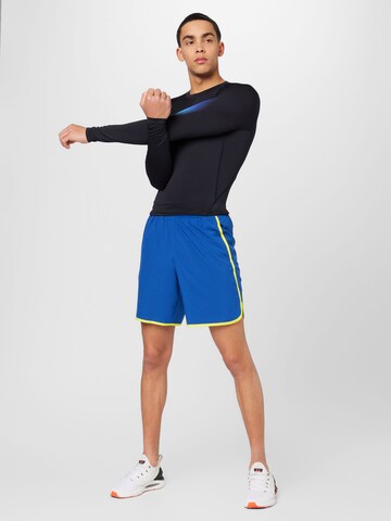 UNDER ARMOUR regular Παντελόνι φόρμας 'HIIT' σε μπλε